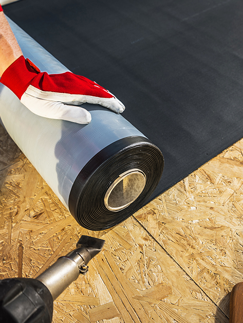 epdm installation being completed by our roofers in Rochester